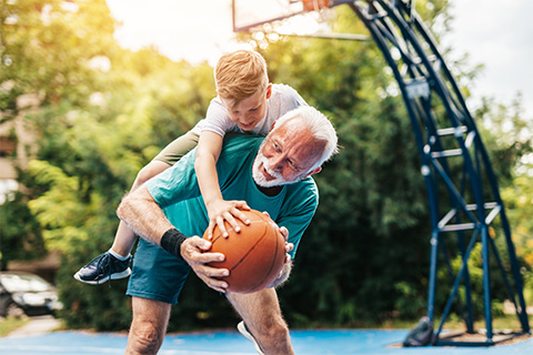 grandfather-and-grandson-on-basketball-court
